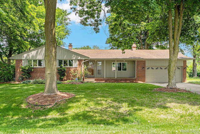 30060 Eastfield St, Farmington Hills, MI 48334 - view of front facade with brick siding, a chimney, and a garage