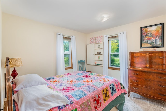 3077 Edson St, Coleman, MI 48618 - carpeted bedroom featuring multiple windows