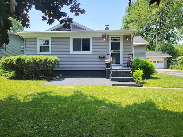 1010 S Pearce St, Owosso, MI 48867 - view of front of home with a front lawn