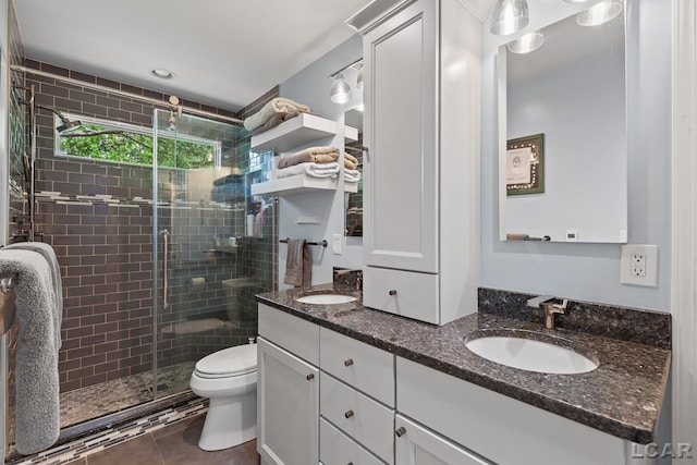 1377 Maplewood Dr St, Saline, MI 48176 - full bath featuring double vanity, a stall shower, toilet, and tile patterned floors