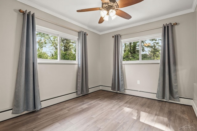 1449 Sauk Ln, Saginaw, MI 48638 - empty room featuring plenty of natural light, wood finished floors, ornamental molding, and a ceiling fan