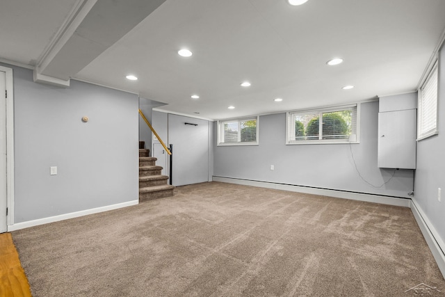 1449 Sauk Ln, Saginaw, MI 48638 - basement with recessed lighting, a baseboard radiator, carpet flooring, and stairway