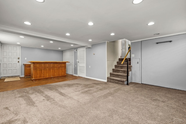 1449 Sauk Ln, Saginaw, MI 48638 - finished below grade area featuring carpet, a bar, stairway, recessed lighting, and crown molding