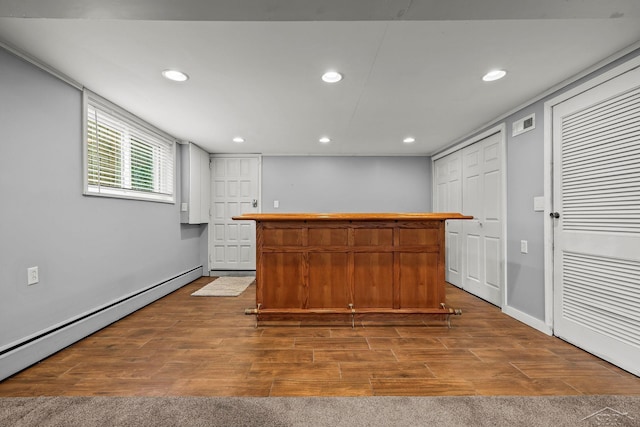 1449 Sauk Ln, Saginaw, MI 48638 - indoor dry bar with wood finished floors, recessed lighting, and baseboard heating