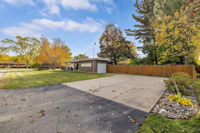 1449 Sauk Ln, Saginaw, MI 48638 - view of yard with a garage