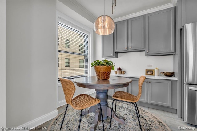15 E Kirby St Unit 304, Detroit, MI 48202 - dining space featuring breakfast area, baseboards, and light tile patterned flooring