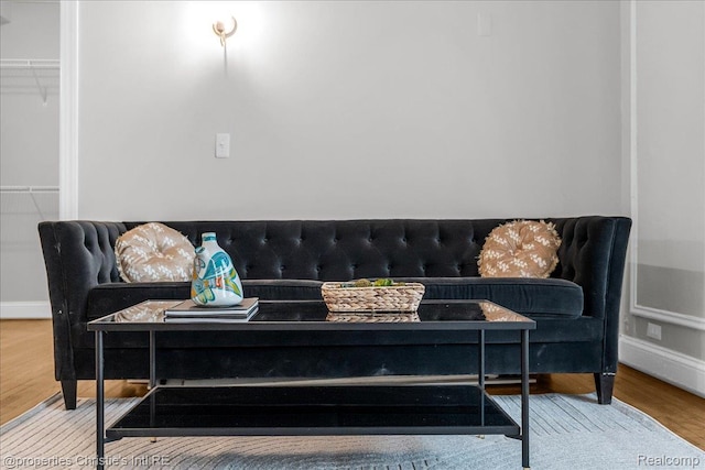 15 E Kirby St Unit 304, Detroit, MI 48202 - living area with wood finished floors and baseboards