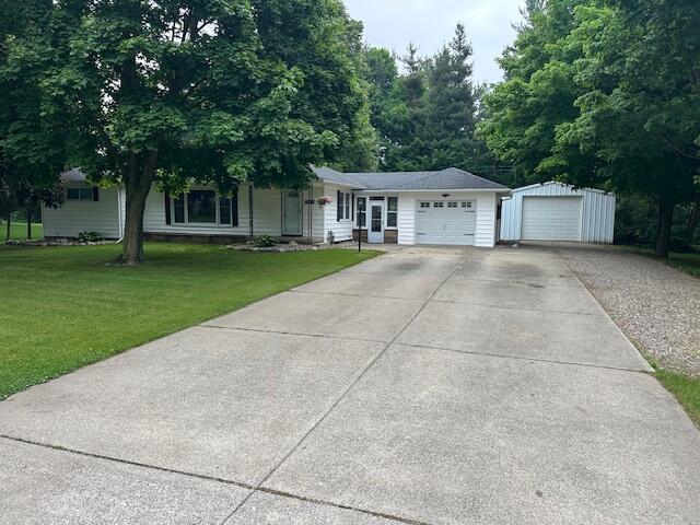 55441 Buckhorn Rd, Three Rivers, MI 49093 - ranch-style home featuring a front lawn and concrete driveway