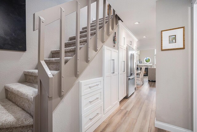 144 Dunkley Ave Unit 4, South Haven, MI 49090 - stairway featuring wood finished floors and recessed lighting