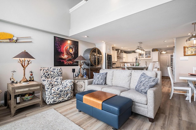 144 Dunkley Ave Unit 4, South Haven, MI 49090 - living room featuring light wood finished floors and recessed lighting