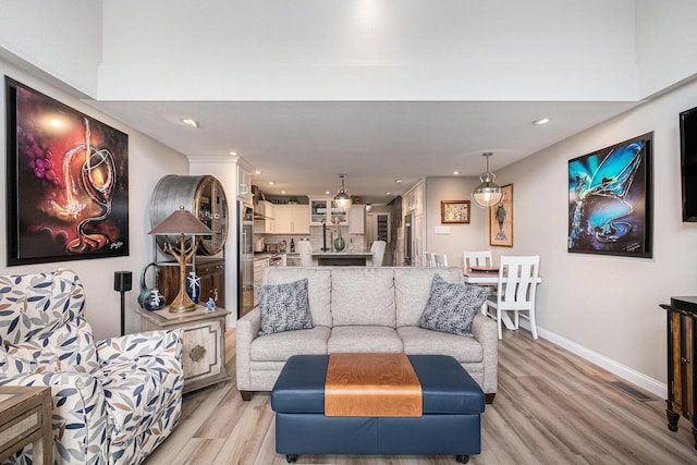 144 Dunkley Ave Unit 4, South Haven, MI 49090 - living room featuring light wood finished floors and recessed lighting