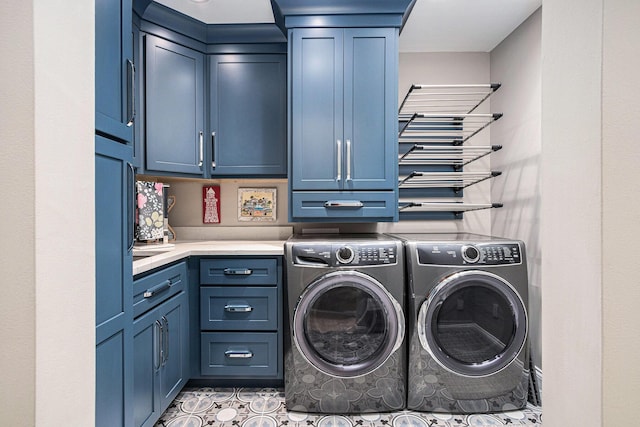 144 Dunkley Ave Unit 4, South Haven, MI 49090 - washroom featuring cabinet space and separate washer and dryer