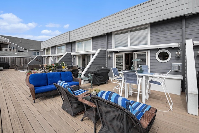 144 Dunkley Ave Unit 4, South Haven, MI 49090 - deck with an outdoor hangout area, outdoor dining space, and a grill
