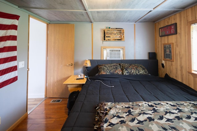 425 Clinton St, Mendon, MI 49072 - bedroom with wood ceiling, wood finished floors, wooden walls, and baseboards