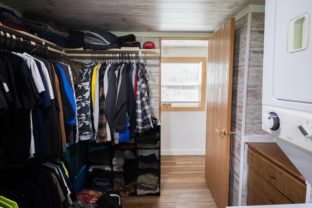 425 Clinton St, Mendon, MI 49072 - walk in closet featuring wood finished floors and estacked washer and dryer