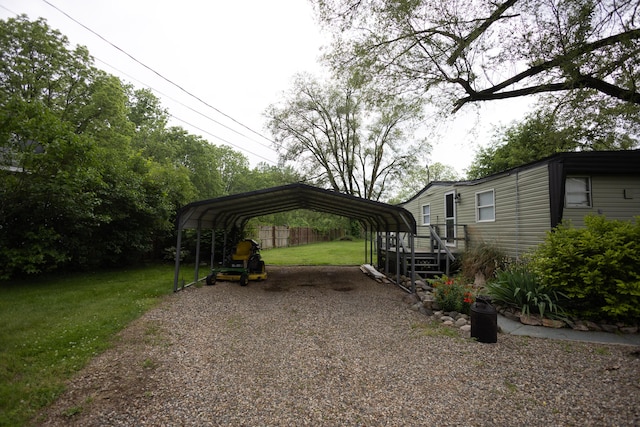425 Clinton St, Mendon, MI 49072 - view of vehicle parking with a detached carport and driveway