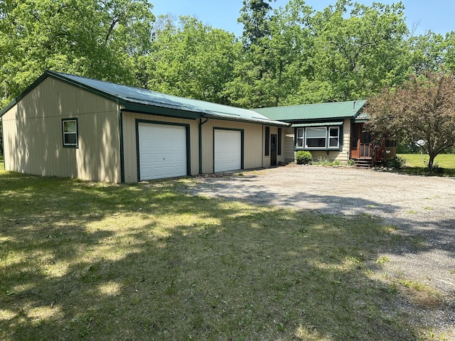 5649 W 76th St, Baldwin, MI 49304 - garage with driveway