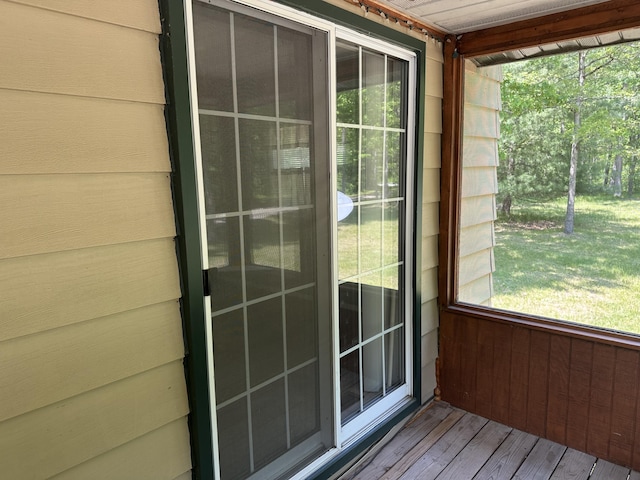 5649 W 76th St, Baldwin, MI 49304 - entryway featuring wood finished floors and plenty of natural light