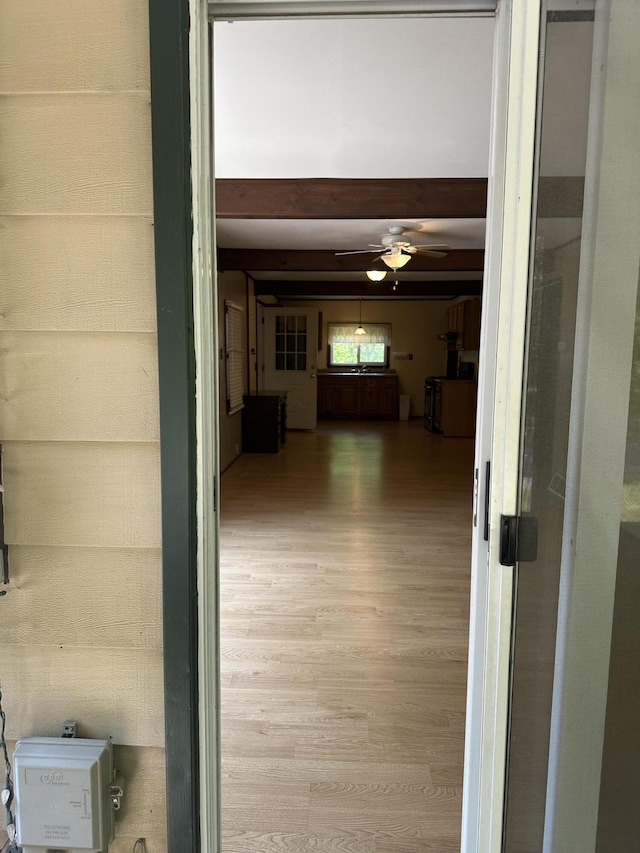 5649 W 76th St, Baldwin, MI 49304 - hall featuring wood finished floors
