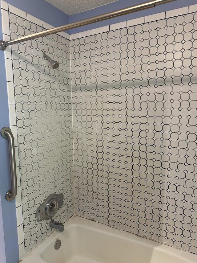 5649 W 76th St, Baldwin, MI 49304 - bathroom featuring bathtub / shower combination