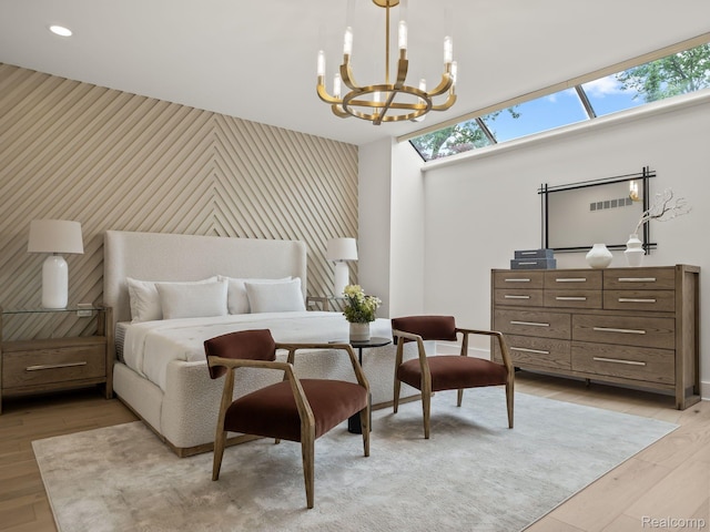 1756 Alexander Dr, Bloomfield Hills, MI 48302 - bedroom with an accent wall, a chandelier, light wood-type flooring, and a skylight