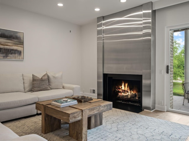 1756 Alexander Dr, Bloomfield Hills, MI 48302 - living room featuring recessed lighting, wood finished floors, and a fireplace