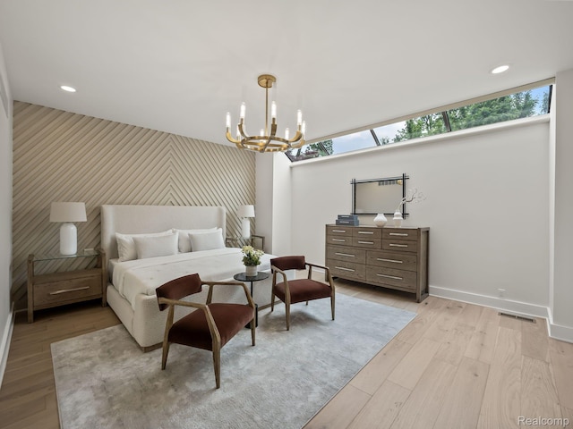 1756 Alexander Dr, Bloomfield Hills, MI 48302 - bedroom featuring an accent wall, baseboards, a chandelier, light wood finished floors, and recessed lighting