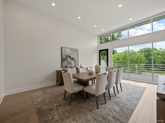 1756 Alexander Dr, Bloomfield Hills, MI 48302 - dining room with a towering ceiling, wood finished floors, recessed lighting, and baseboards