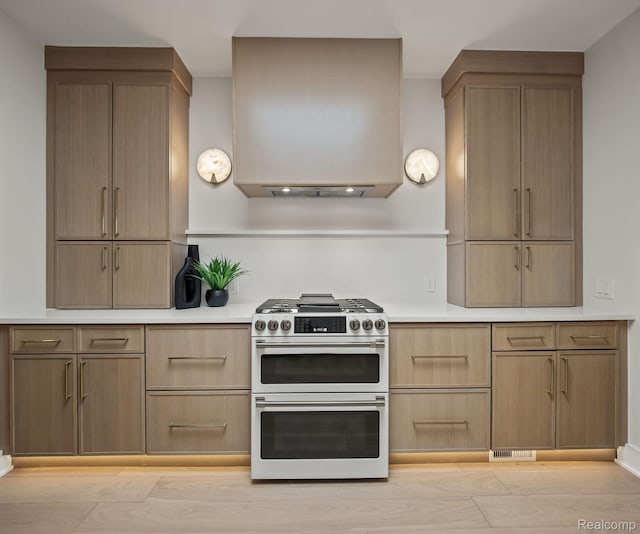 1756 Alexander Dr, Bloomfield Hills, MI 48302 - kitchen with double oven range, light countertops, exhaust hood, and light brown cabinets