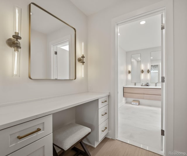 1756 Alexander Dr, Bloomfield Hills, MI 48302 - bathroom with vanity, wood finished floors, and recessed lighting