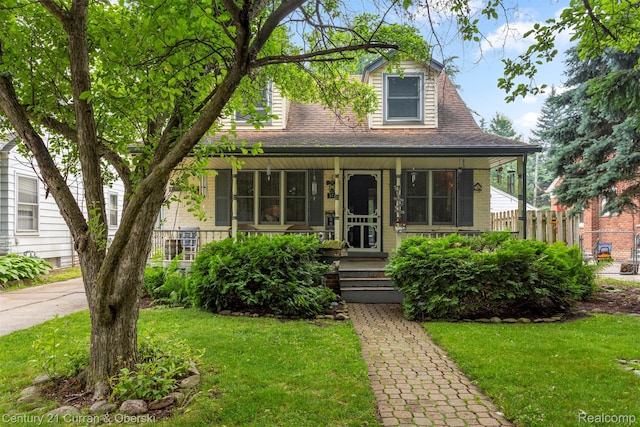 3128 Woodside Dr, Dearborn, MI 48124 - view of front facade featuring a porch