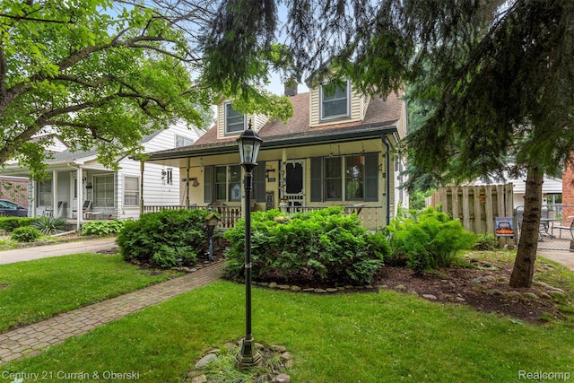 3128 Woodside Dr, Dearborn, MI 48124 - view of front of house with covered porch and a chimney