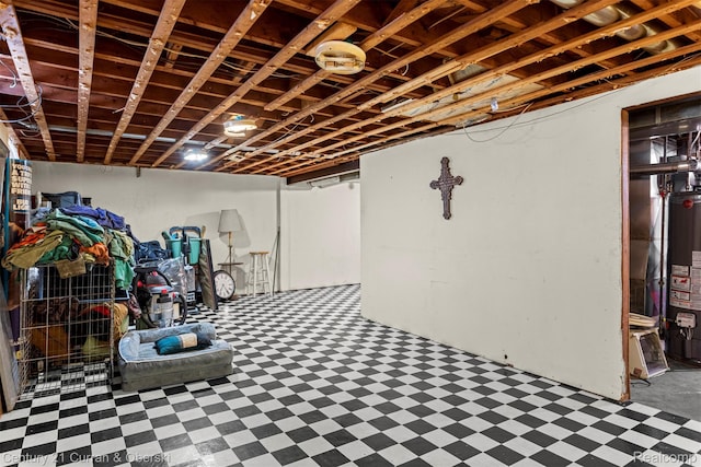 3128 Woodside Dr, Dearborn, MI 48124 - finished below grade area featuring tile patterned floors and water heater