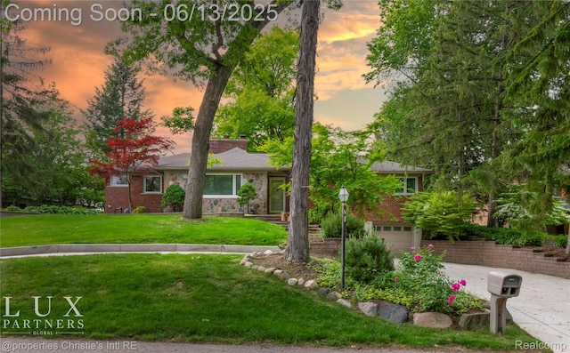 1700 Hamilton Dr, Bloomfield Hills, MI 48302 - view of front facade with a yard, concrete driveway, a garage, and a chimney