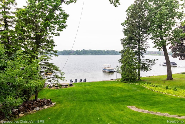 1700 Hamilton Dr, Bloomfield Hills, MI 48302 - view of grassy yard featuring a floating dock and a water view