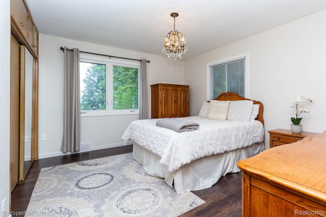 1700 Hamilton Dr, Bloomfield Hills, MI 48302 - bedroom featuring a chandelier and dark wood-style flooring
