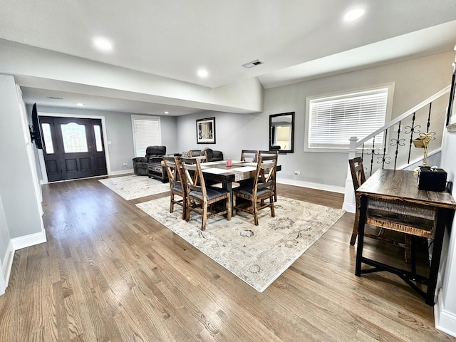 1982 S Benton Center Rd, Benton Harbor, MI 49022 - dining space featuring stairway, wood finished floors, baseboards, and recessed lighting
