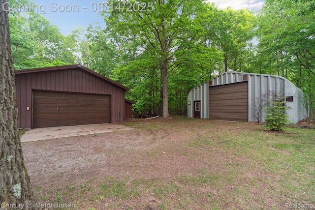 14210 W Burt Rd W, Chesaning, MI 48616 - view of yard with a garage and an outdoor structure