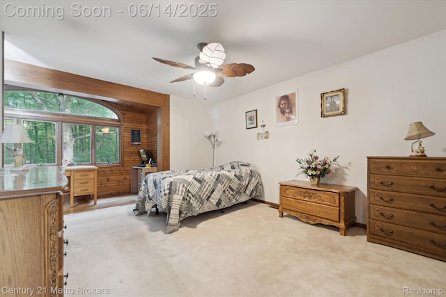 14210 W Burt Rd W, Chesaning, MI 48616 - carpeted bedroom with ceiling fan and wooden walls