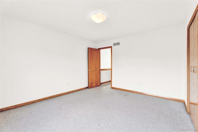 1870 Cass Lake Front Rd, Keego Harbor, MI 48320 - carpeted empty room with baseboards