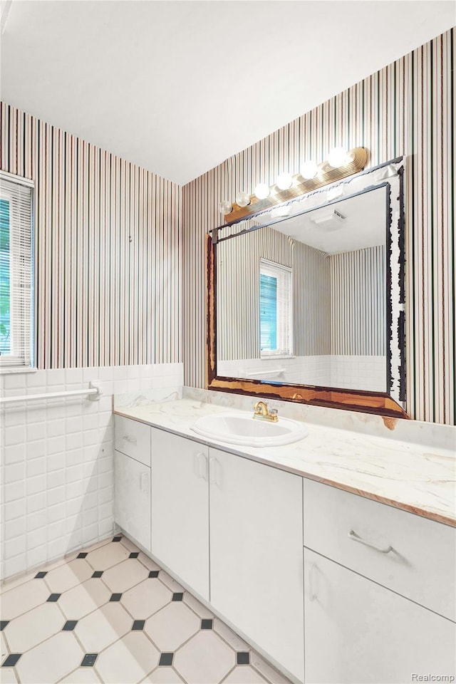 1870 Cass Lake Front Rd, Keego Harbor, MI 48320 - bathroom featuring wallpapered walls and vanity