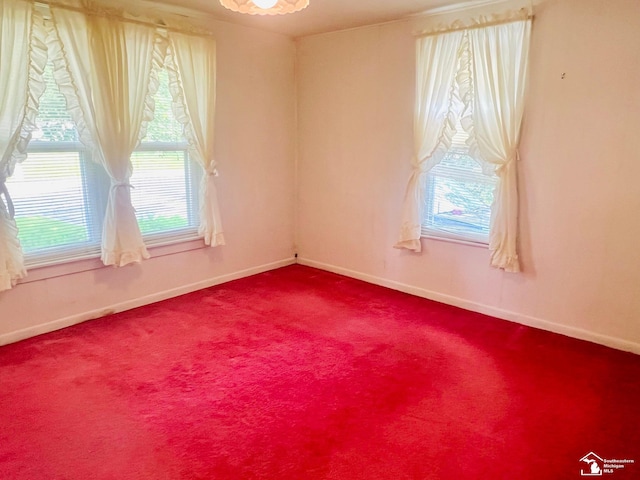 3421 3rd St, Trenton, MI 48183 - unfurnished room with baseboards and dark carpet