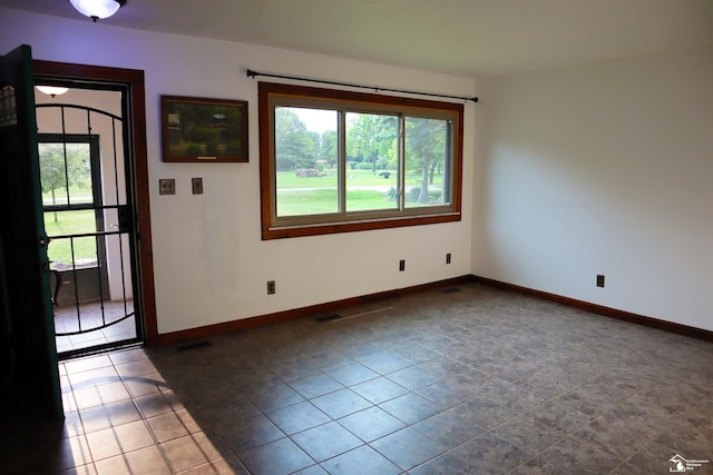 6336 Moreland Dr, Erie, MI 48133 - tiled entryway featuring baseboards