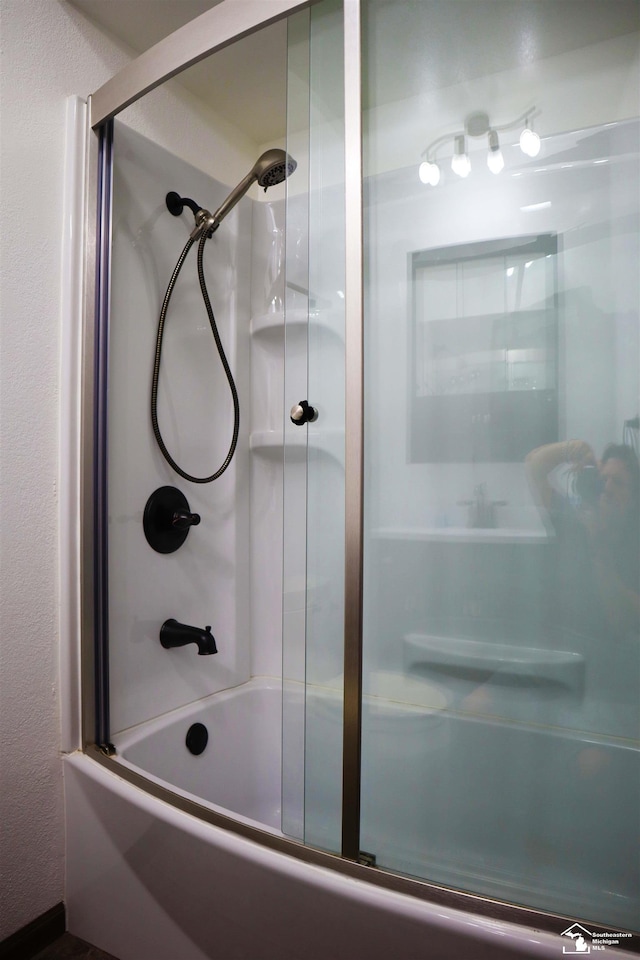 6336 Moreland Dr, Erie, MI 48133 - full bathroom featuring combined bath / shower with glass door