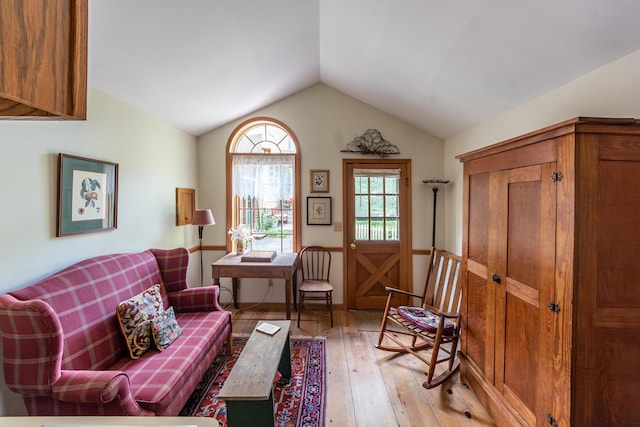 8425 Parshallville Rd, Fenton, MI 48430 - living area with light wood-style flooring and lofted ceiling