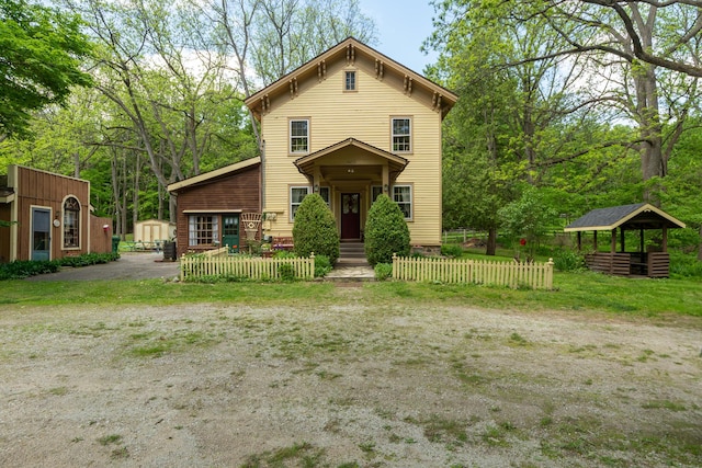 8425 Parshallville Rd, Fenton, MI 48430 - italianate-style house featuring an outdoor structure