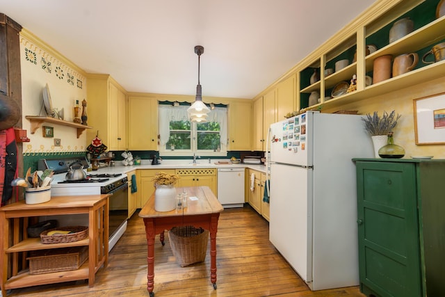 8425 Parshallville Rd, Fenton, MI 48430 - kitchen featuring open shelves, white appliances, a sink, wood finished floors, and light countertops