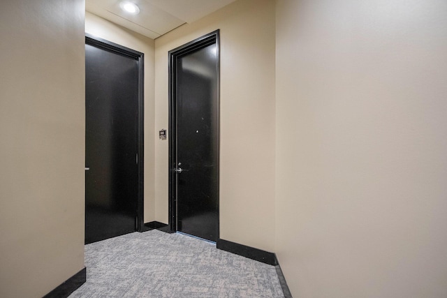 335 Bridge St NW Unit 500, Grand Rapids, MI 49504 - hall with carpet flooring, baseboards, and recessed lighting