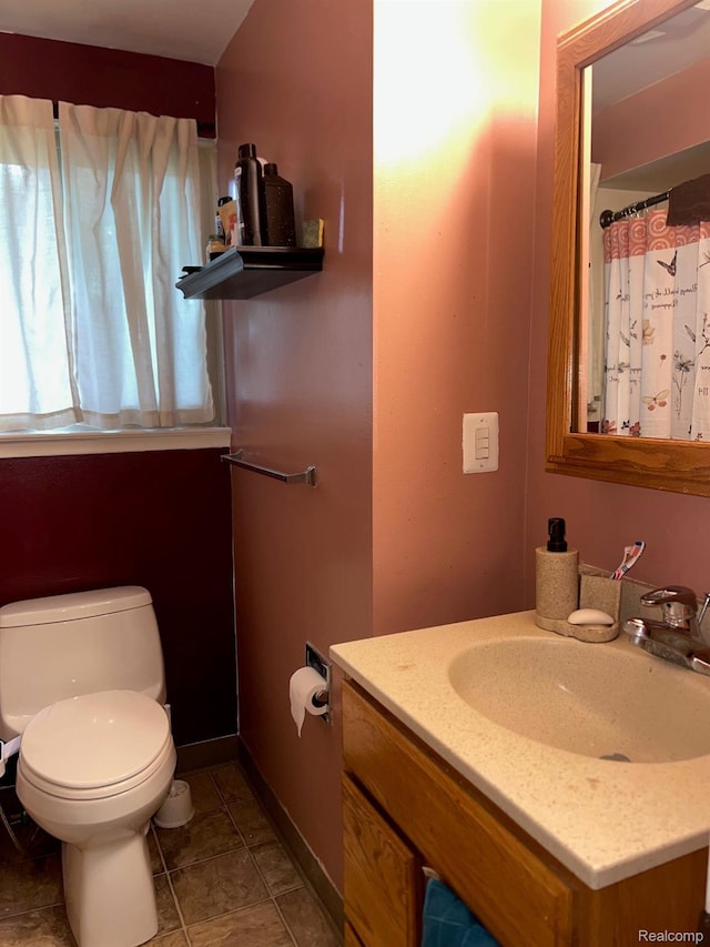 23538 Baker, Taylor, MI 48180 - bathroom with vanity, toilet, and baseboards