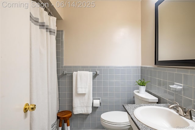28441 Westerleigh Rd, Farmington, MI 48334 - bathroom with tile walls, curtained shower, a wainscoted wall, and vanity
